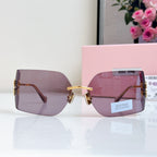 Miu Miu New Rimless Shield Sunglasses