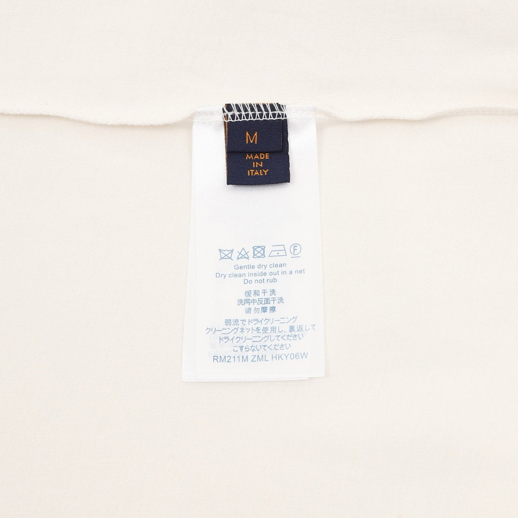 Louis Vuitton Short-Sleeve T-Shirt featuring Oil Painting Splatter, Handwritten Signature, and Embossed Relief Details.