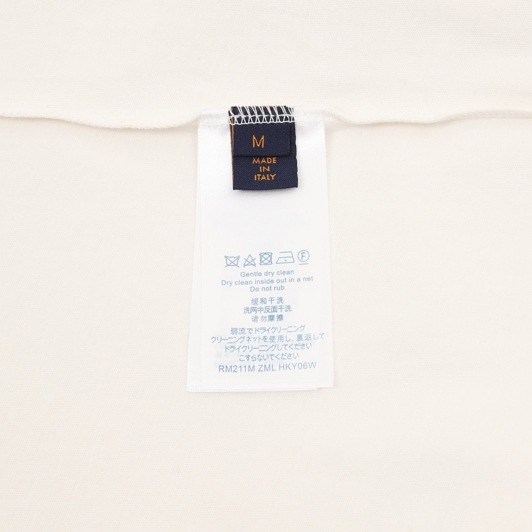 Louis Vuitton Short-Sleeve T-Shirt featuring Oil Painting Splatter, Handwritten Signature, and Embossed Relief Details.